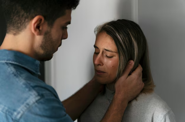 family-abuse A man holding a woman's hair